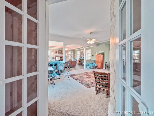293 Windsong, Camdenton, MO 65020 - carpeted office featuring arched walkways, a ceiling fan, and french doors