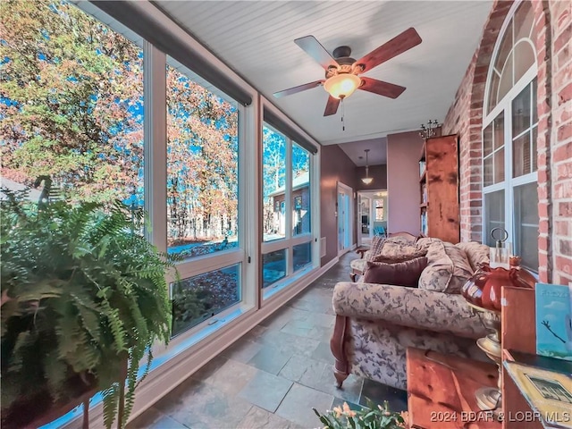 293 Windsong, Camdenton, MO 65020 - sunroom featuring stone tile floors