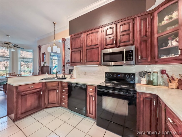 kitchen featuring black appliances, ornamental molding, light tile patterned floors, hanging light fixtures, and sink