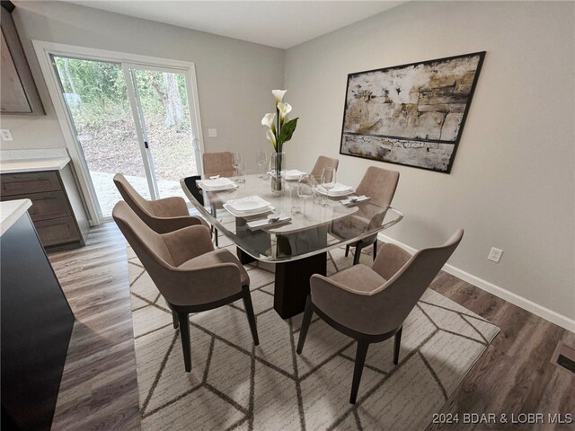 dining space featuring light hardwood / wood-style flooring