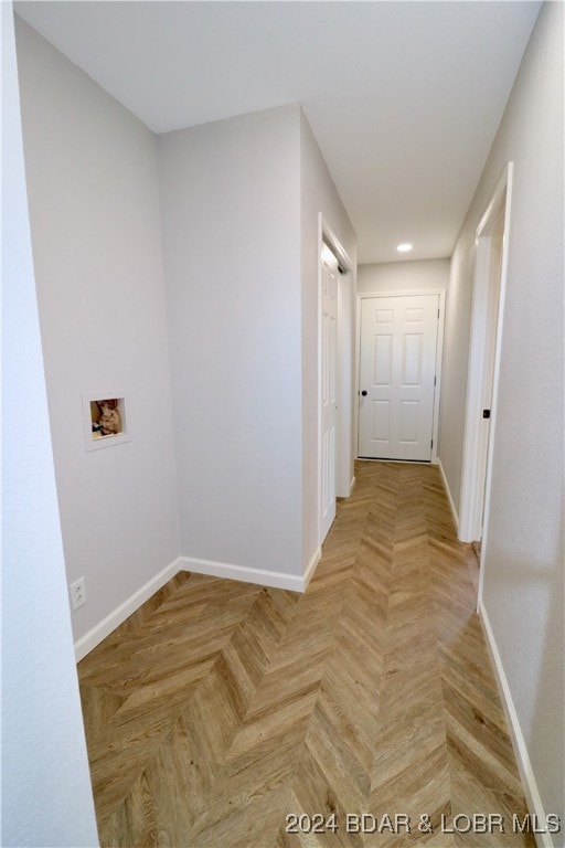 hallway featuring light parquet floors