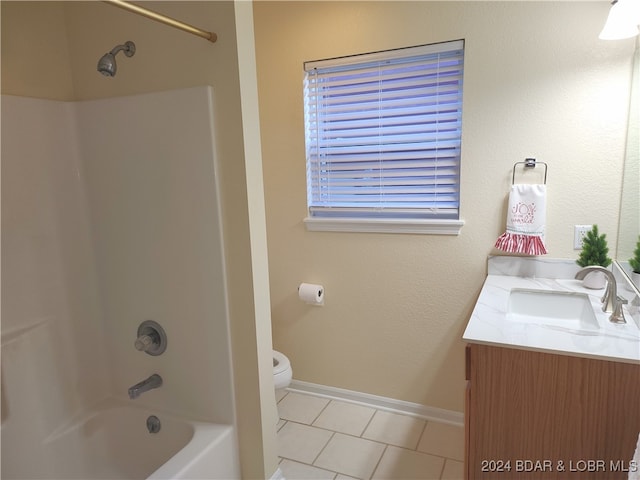 full bathroom with tile patterned flooring, vanity, bathtub / shower combination, and toilet