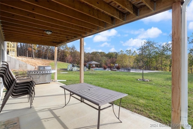 view of patio with a grill