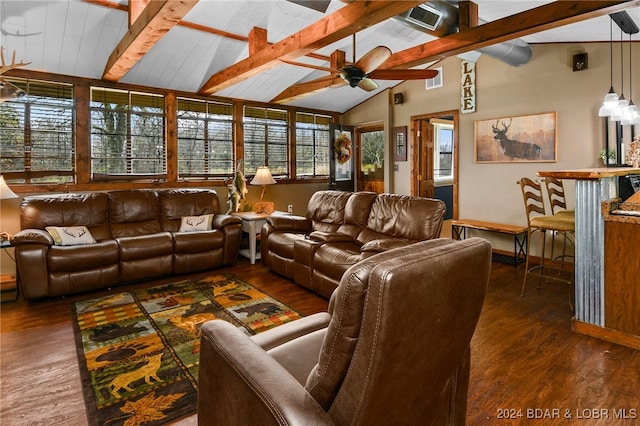 living room with ceiling fan, vaulted ceiling with beams, a healthy amount of sunlight, and dark hardwood / wood-style floors