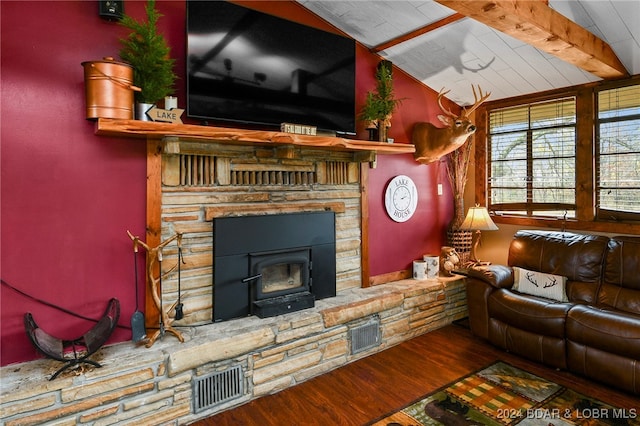 living room featuring lofted ceiling with beams and wood-type flooring