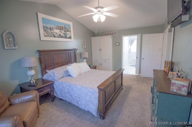 carpeted bedroom featuring ceiling fan, lofted ceiling, and a closet