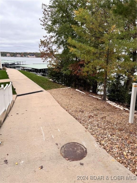 view of property's community featuring a water view