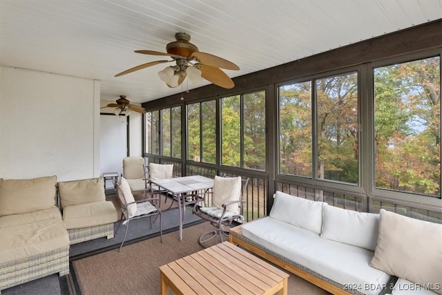 sunroom / solarium with ceiling fan and a healthy amount of sunlight