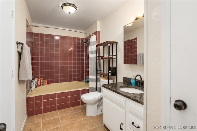 full bathroom with toilet, shower / tub combo, vanity, and tile patterned floors