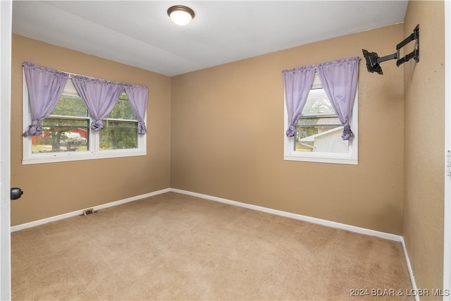 view of carpeted spare room