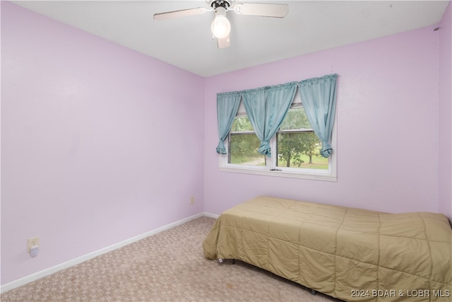 bedroom featuring carpet floors and ceiling fan