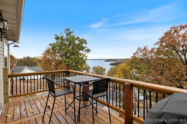 deck featuring a water view