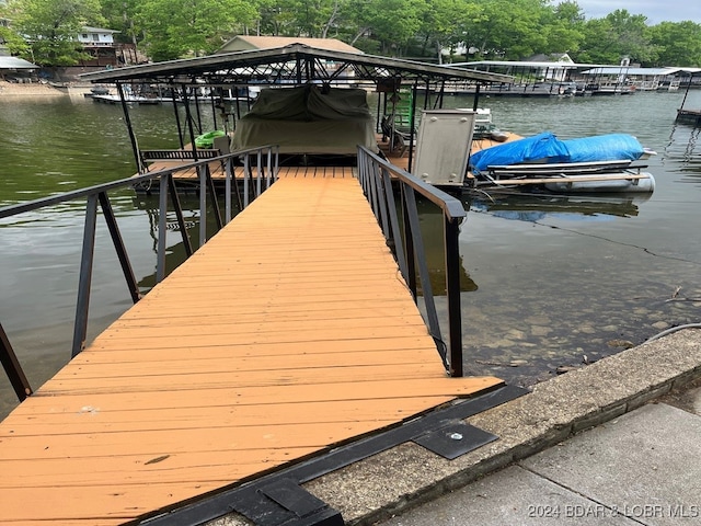 view of dock with a water view