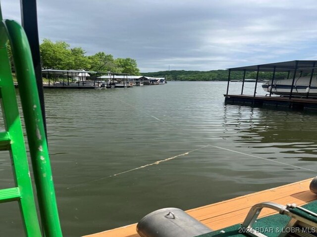 view of dock with a water view