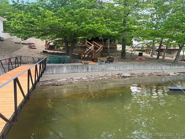 dock area featuring a water view