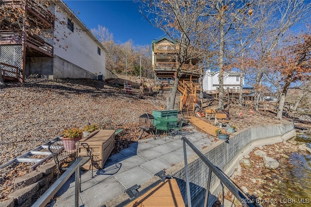 view of patio with stairway