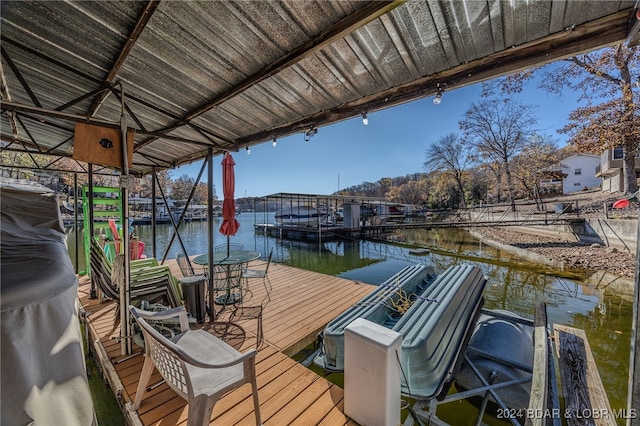 view of dock with a water view