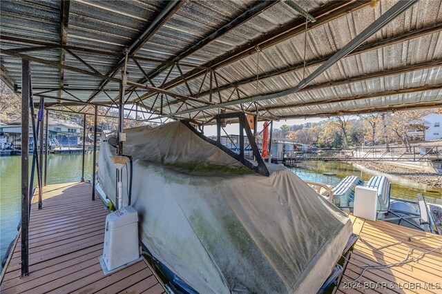 dock area featuring a water view