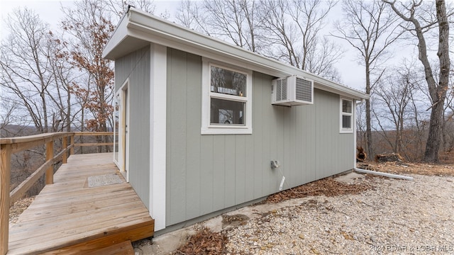 view of property exterior featuring a deck