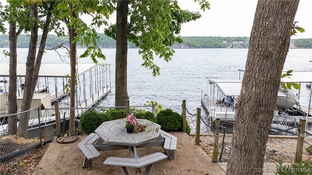 view of dock with a water view