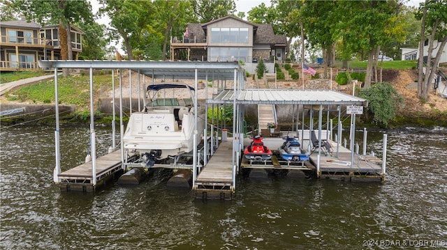 dock area featuring a water view