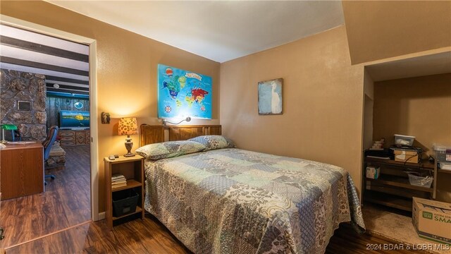 bedroom featuring dark hardwood / wood-style floors