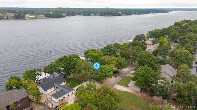 drone / aerial view with a water view