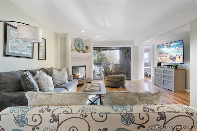 living room with light hardwood / wood-style floors