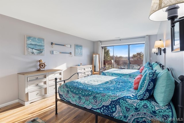 bedroom featuring wood-type flooring