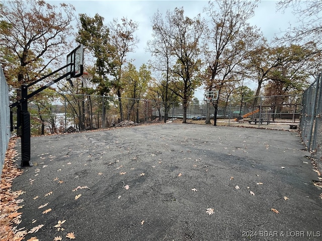 view of yard with basketball court