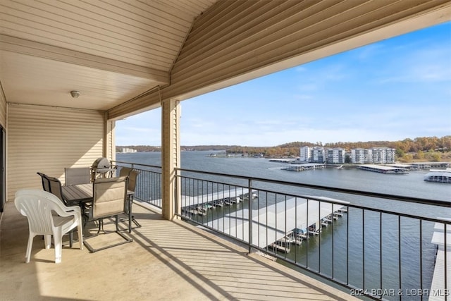 balcony featuring a water view