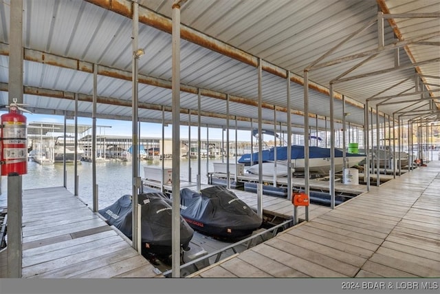 dock area with a water view