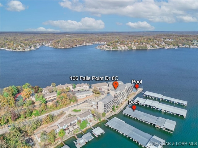 birds eye view of property featuring a water view