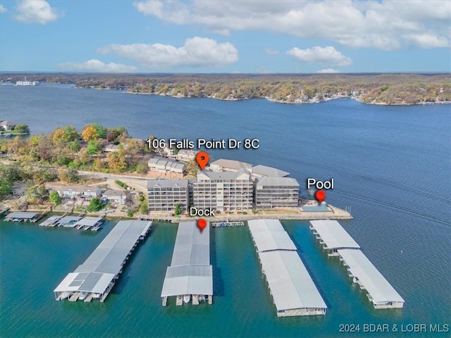 birds eye view of property featuring a water view