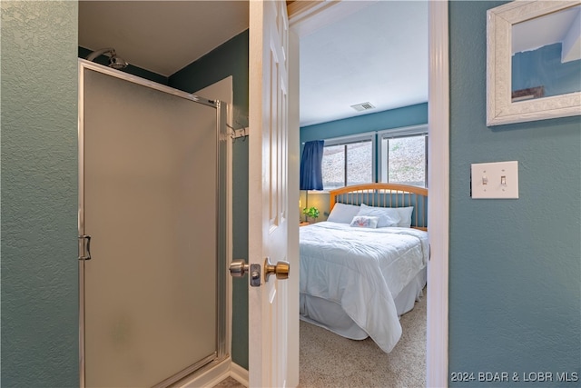 bedroom featuring carpet