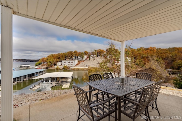 view of patio with a water view