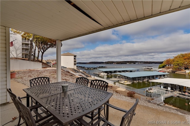 view of patio featuring a water view