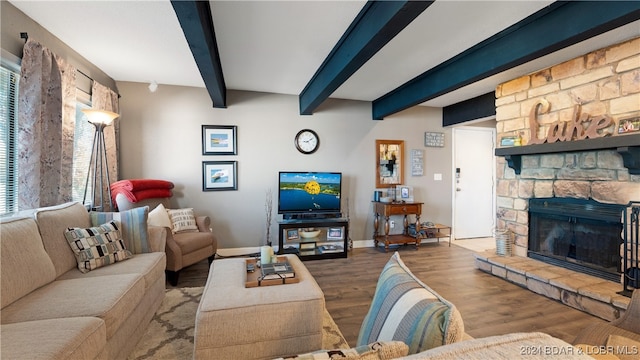 living room with beam ceiling, wood-type flooring, and a fireplace