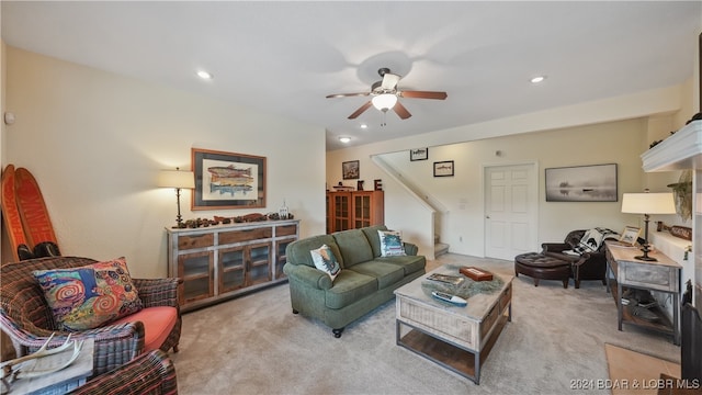 living room with light carpet and ceiling fan