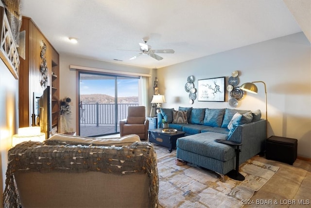 living room featuring ceiling fan