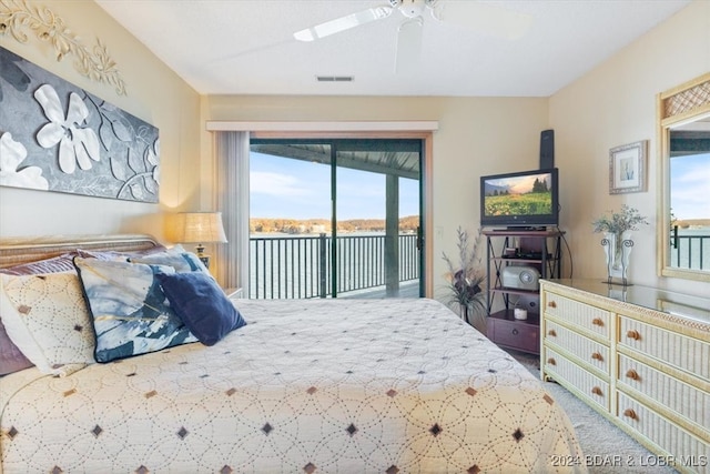 carpeted bedroom featuring access to outside and ceiling fan