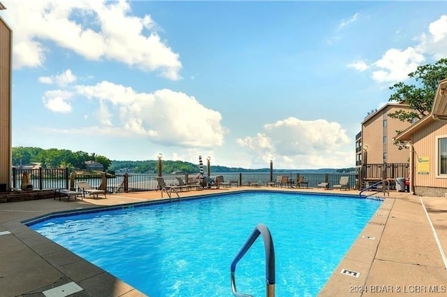 view of pool featuring a patio area