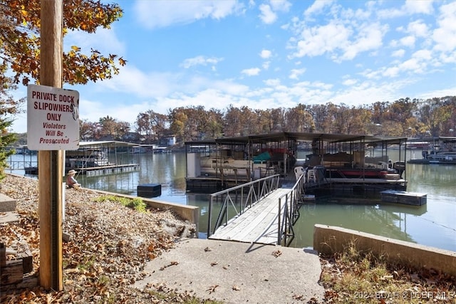 view of dock with a water view