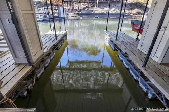 dock area featuring a water view