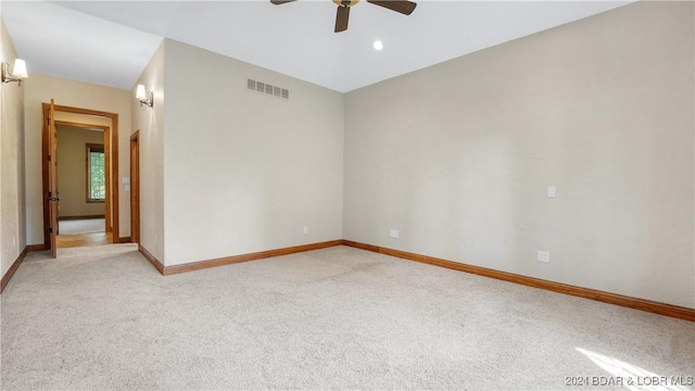 carpeted empty room with ceiling fan