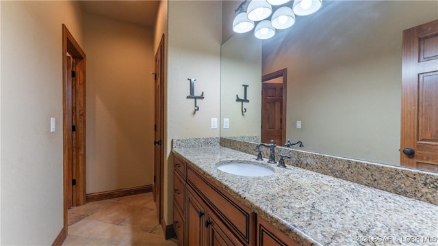 bathroom featuring tile patterned floors and vanity