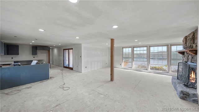 living room featuring a fireplace