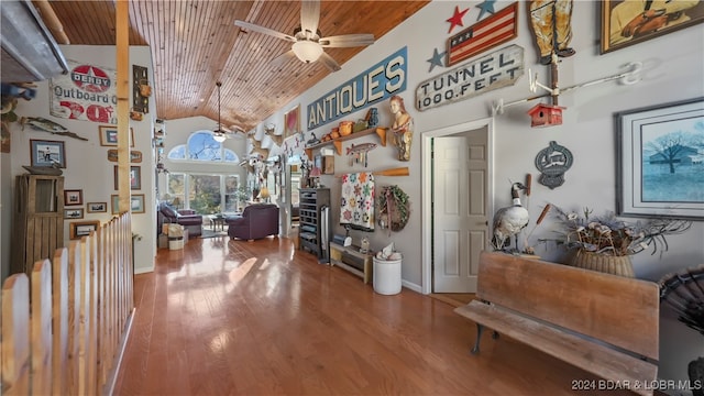 miscellaneous room featuring hardwood / wood-style flooring, ceiling fan, wood ceiling, and high vaulted ceiling