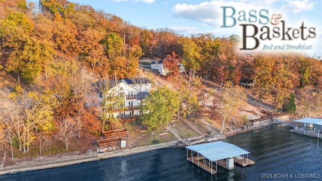 drone / aerial view featuring a water view