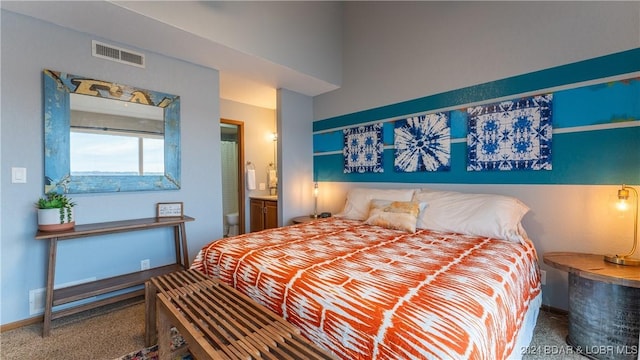 2500 Bay Point Ln Unit 645, Osage Beach, MO 65065 - bedroom with carpet and ensuite bathroom